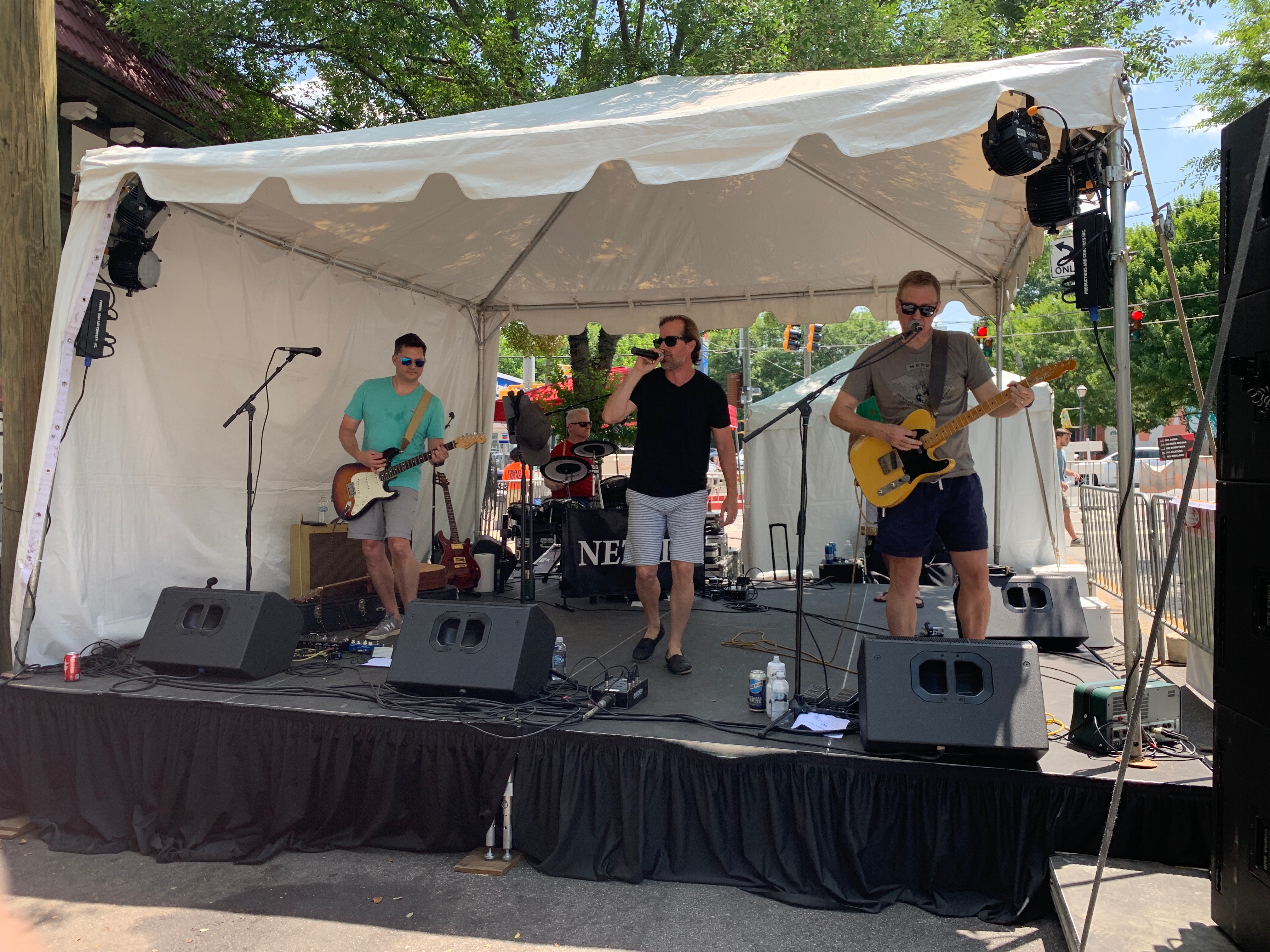 Lead singer performing at outdoor festival